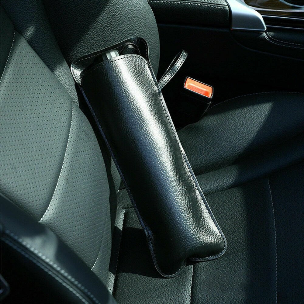 ShadeFlip folded in its storage sleeve on a car seat