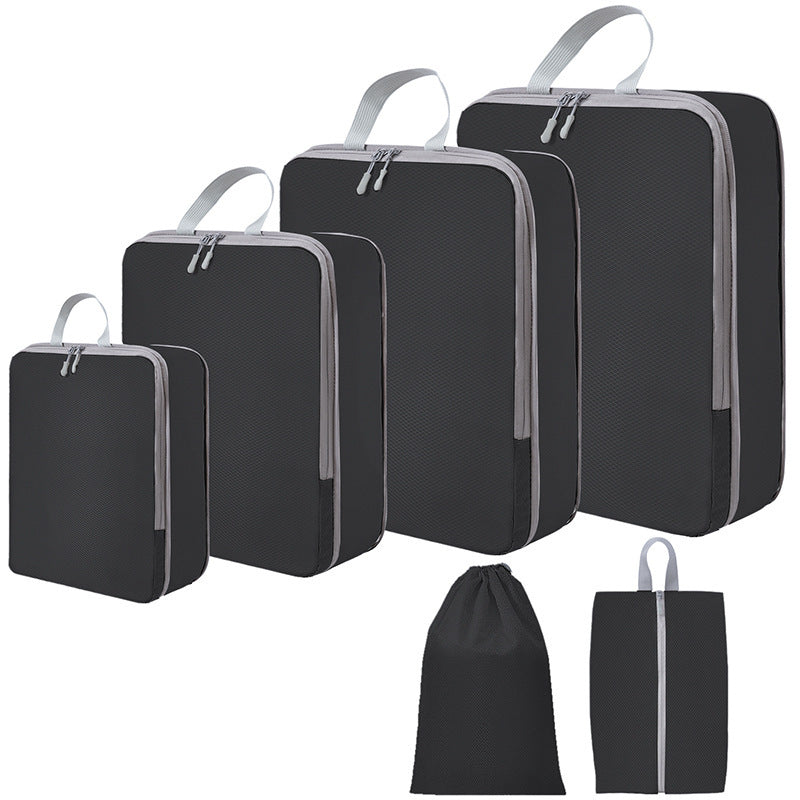 PackMax 6-piece set in black: 4 compression cubes, a drawstring bag and a shoe bag