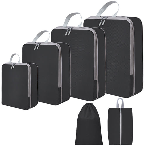 PackMax 6-piece set in black: 4 compression cubes, a drawstring bag and a shoe bag