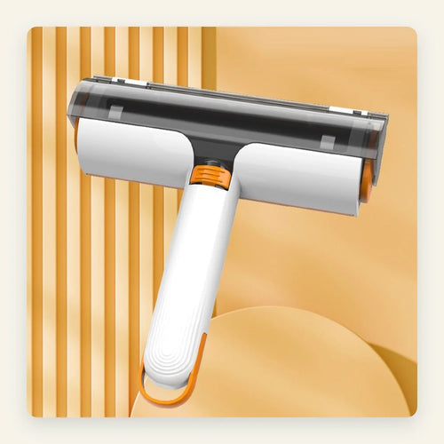FurFlick reusable pet hair remover in white with orange trim on a warm studio background