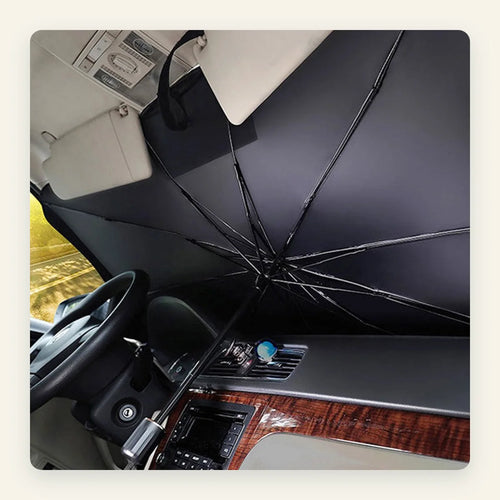 ShadeFlip umbrella sunshade opened across the inside of a car windscreen